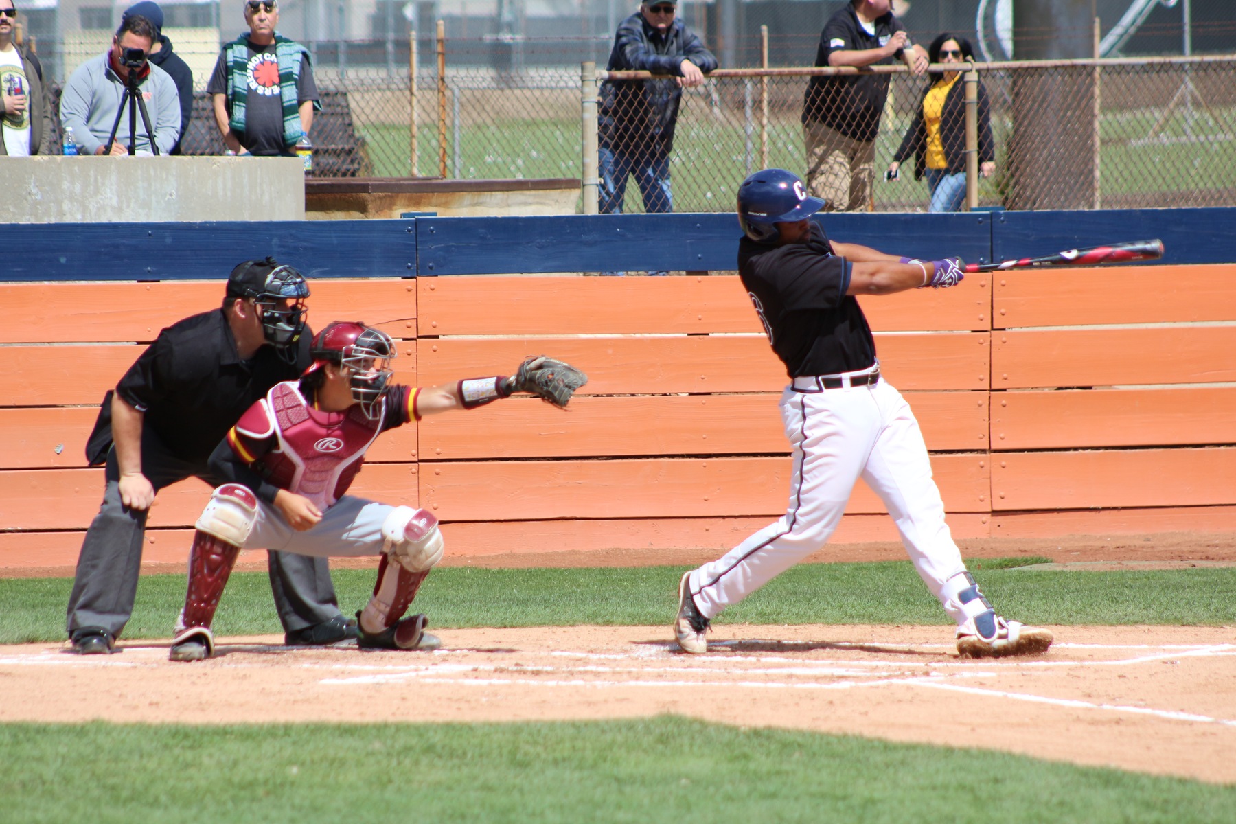 Kristian Scott bombs a monster 400 foot homer on Saturday.