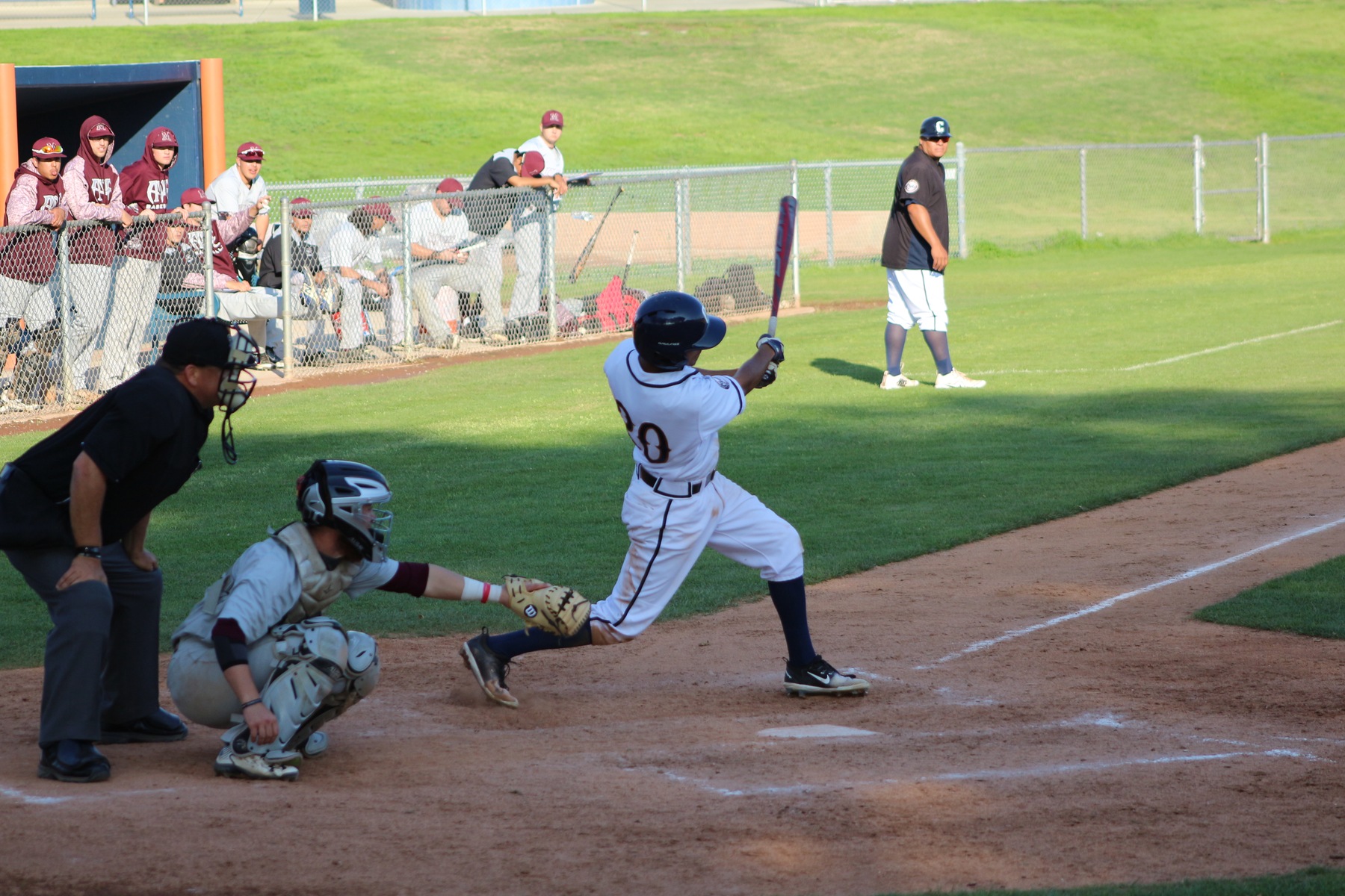 Donvyn Curiel pulls a line drive to left field.