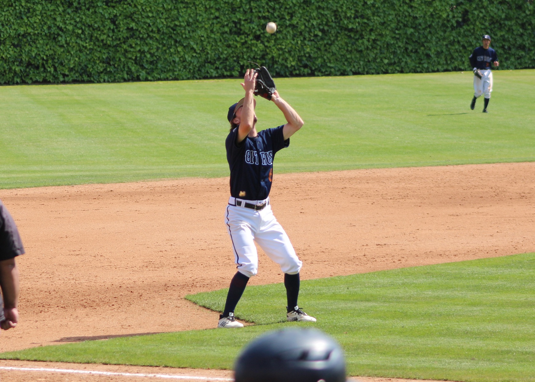 Ethan Cummins catches a pop fly at 3rd base. Image: Richard Miranda, II
