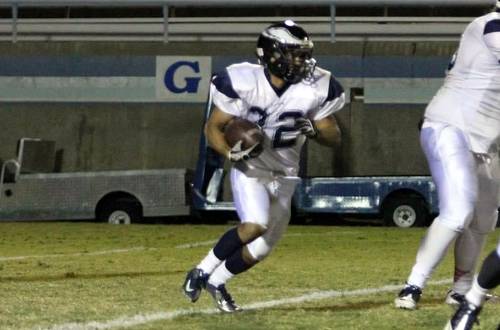 Sophomore running back Phillip Sainz carried the ball 16 times for 112 yards on Saturday afternoon at Long Beach. Photo By: Doug Bergen