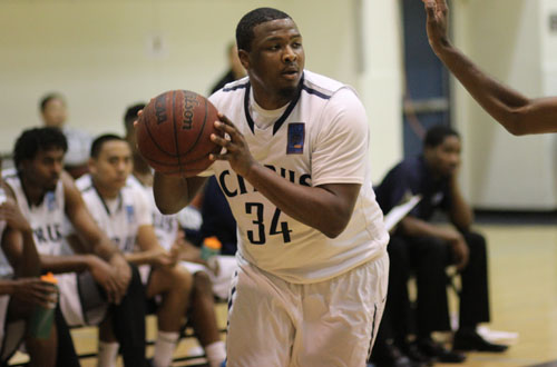 Freshman Tyler LaCour scored 14 points off the bench for the Owls in their win over Canyons. Photo By: Robert Lopez