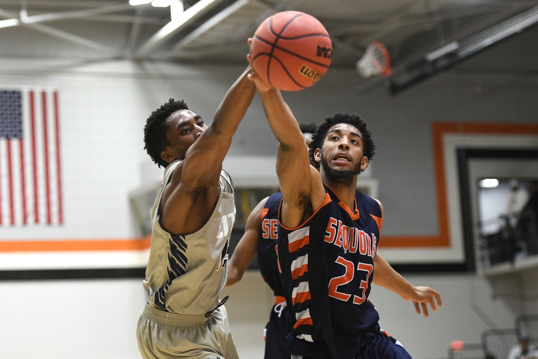 Psalm Maduakor battles for a rebound. Image: Mike Baker