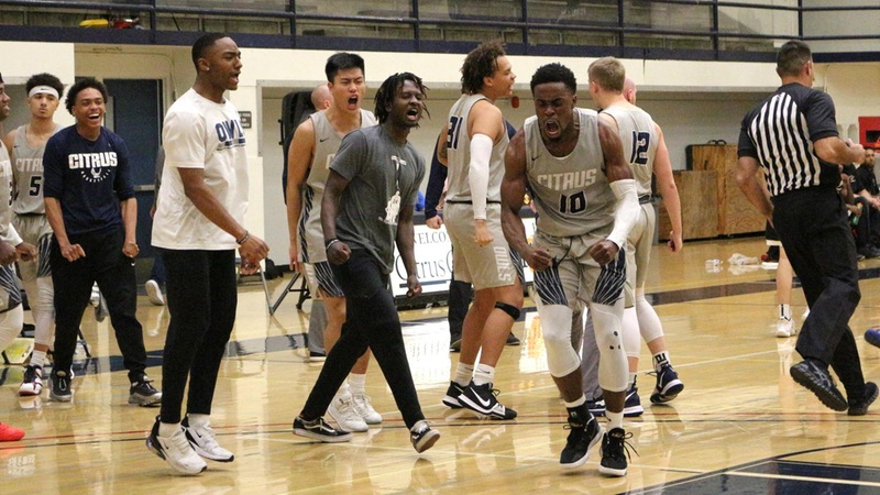 Toby Okwuokei celebrates the Owls' 81-80 victory with his teammates. Photo by: Brianna Jara