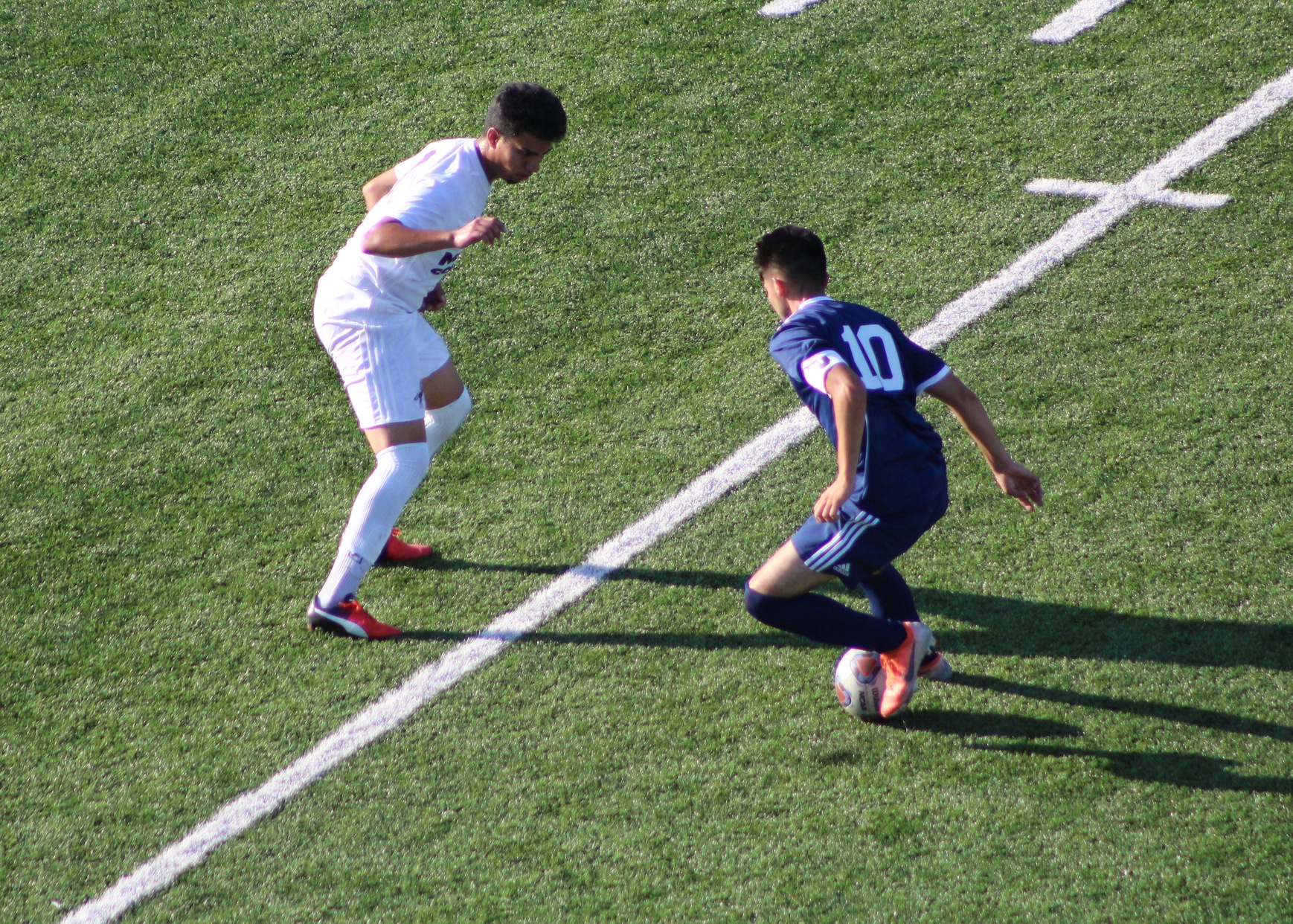Team captain Imer Figueroa sets his defender up for a juke.