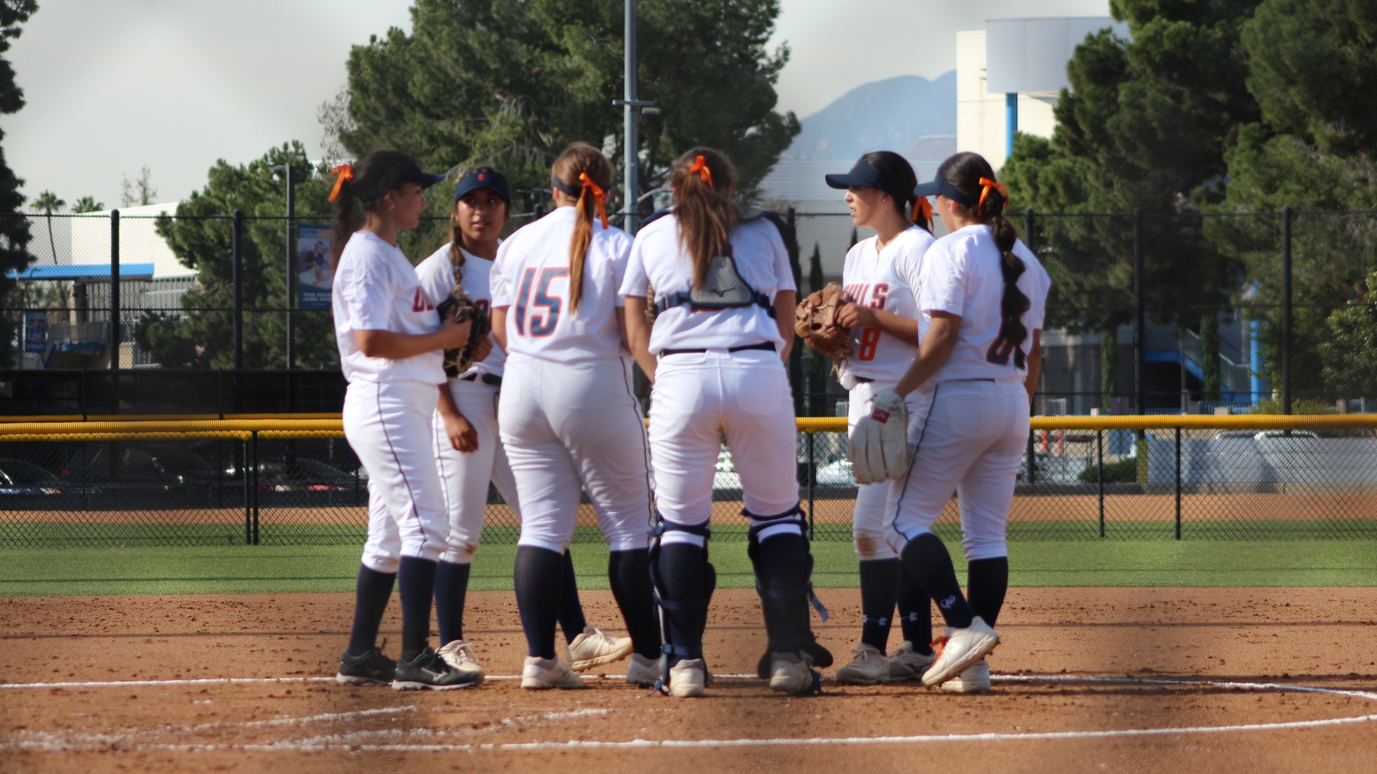The Citrus softball team huddles up. Photo by: Brianna Jara