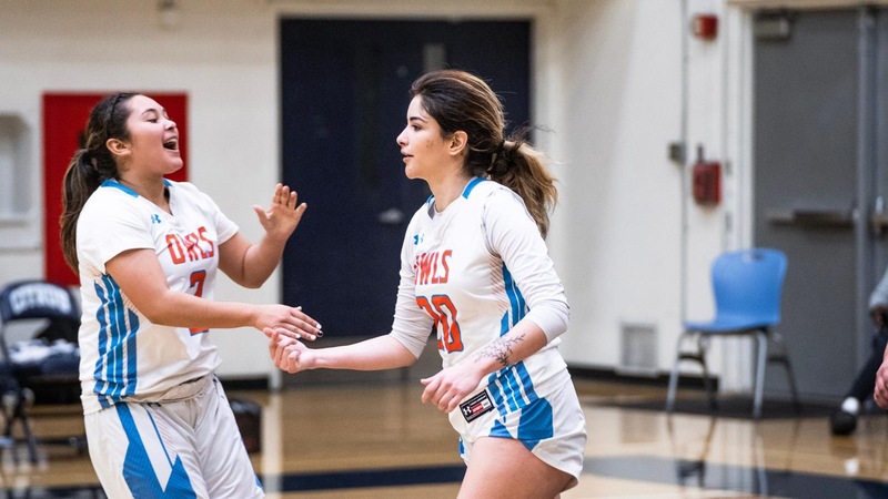 Felicity Mendoza high fives Joceline Escamilla. Photo by Danyil German