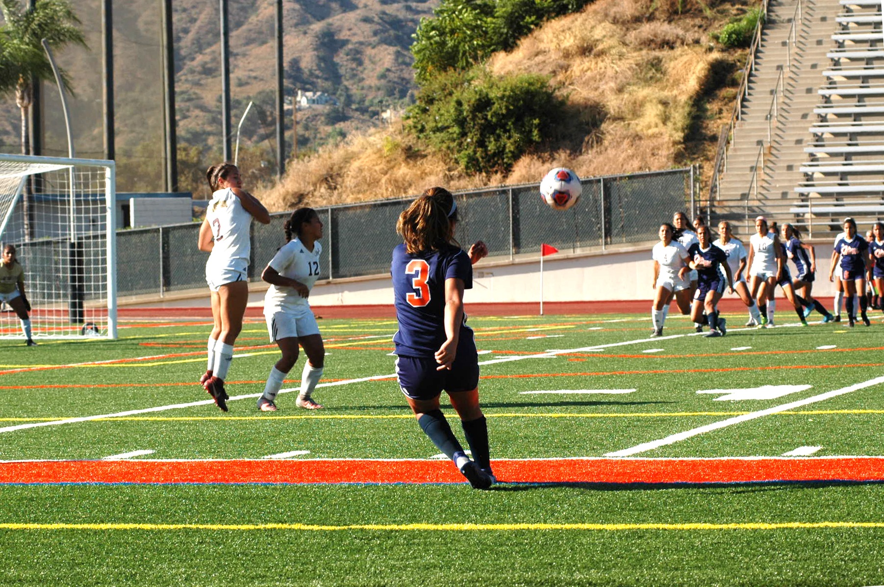Amethyst Trang sends a cross-ball to her teammates in wait. Image: Thomas Garcia